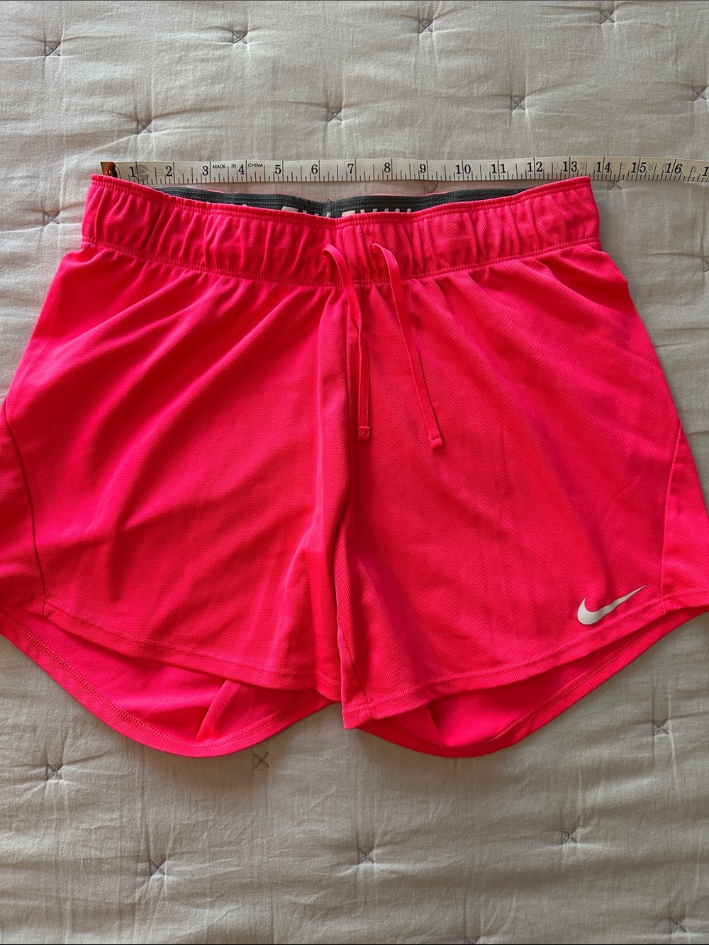 Nike Women's Neon Pink Athletic Shorts with Swoosh